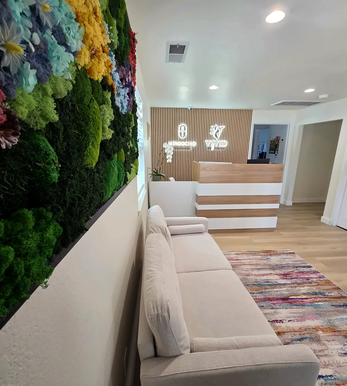 The lobby: moss wall, soft light